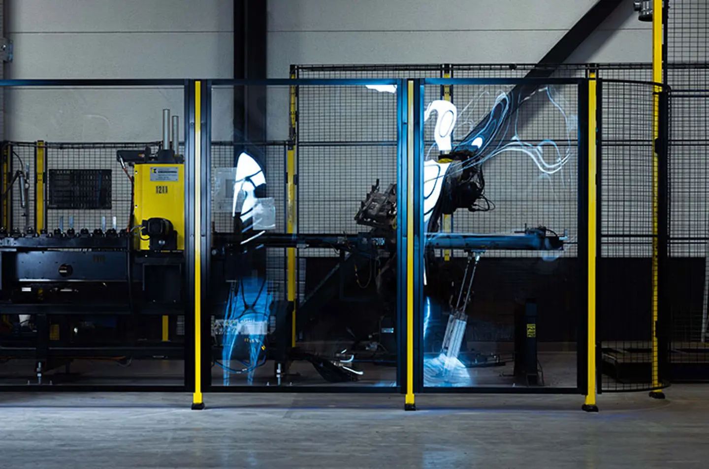 Machine guards in plastic sheilding an industrial machine in action